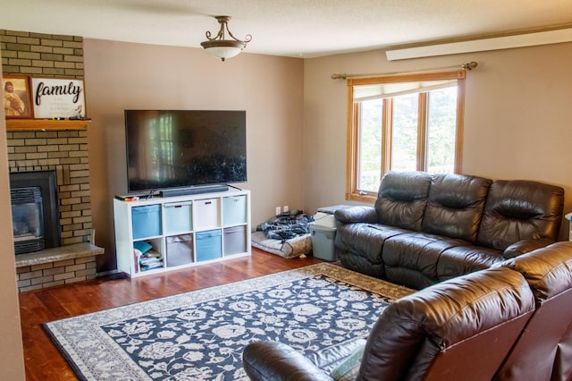 44818 215th Ave, Staples Twp, MN 56479 - living area featuring wood finished floors and a brick fireplace