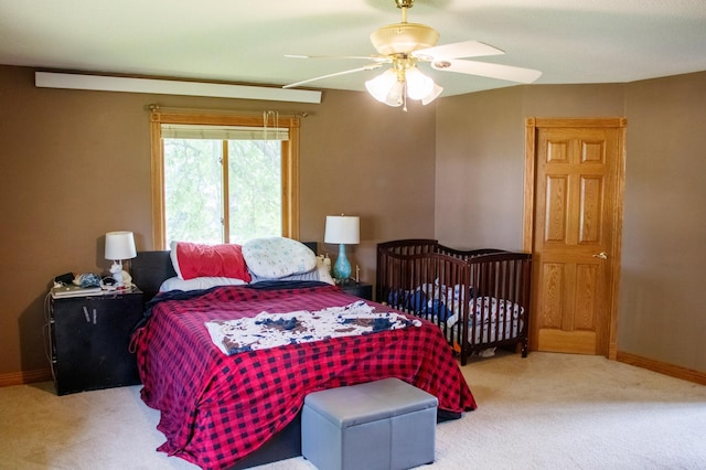 44818 215th Ave, Staples Twp, MN 56479 - carpeted bedroom featuring baseboards and a ceiling fan