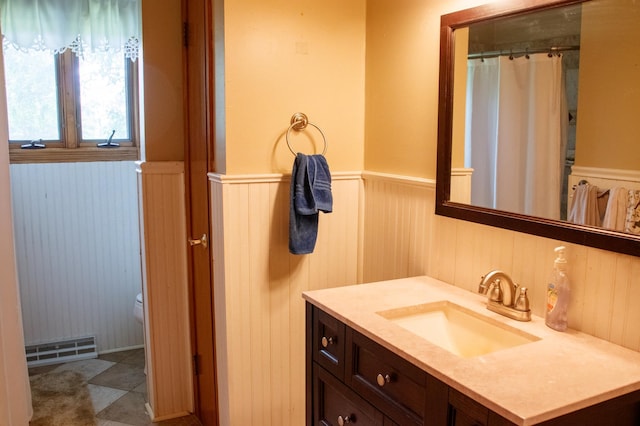 44818 215th Ave, Staples Twp, MN 56479 - bathroom featuring a wainscoted wall and vanity