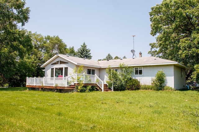 44818 215th Ave, Staples Twp, MN 56479 - view of front of home featuring a deck and a front yard