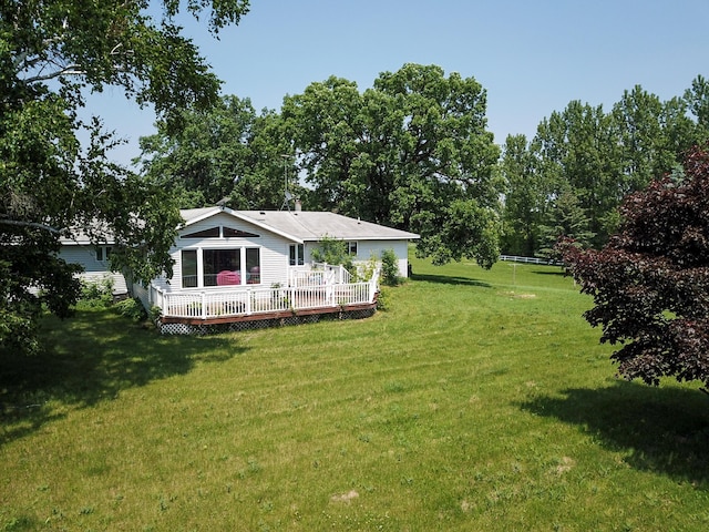 44818 215th Ave, Staples Twp, MN 56479 - view of grassy yard featuring a wooden deck