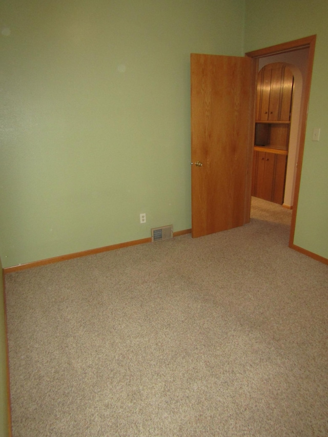 421 8th Ave, Madison, MN 56256 - carpeted spare room with baseboards