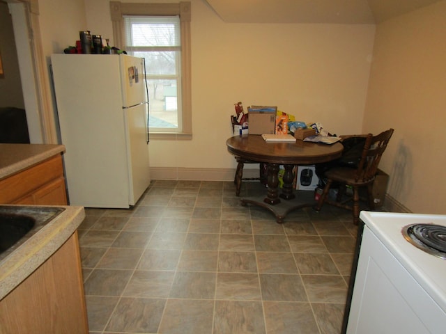 421 8th Ave, Madison, MN 56256 - dining room featuring baseboards