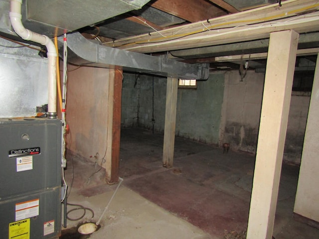 421 8th Ave, Madison, MN 56256 - unfinished below grade area featuring heating unit
