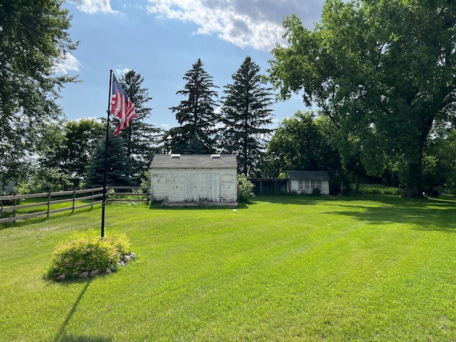 355 20th St SW, Benson, MN 56215 - view of yard with a storage unit