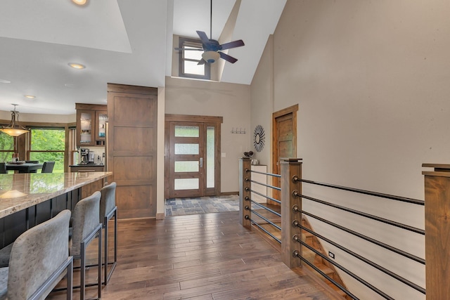27806 Sundance Ln, Cold Spring, MN 56320 - entryway with a ceiling fan, dark wood-type flooring, high vaulted ceiling, and recessed lighting
