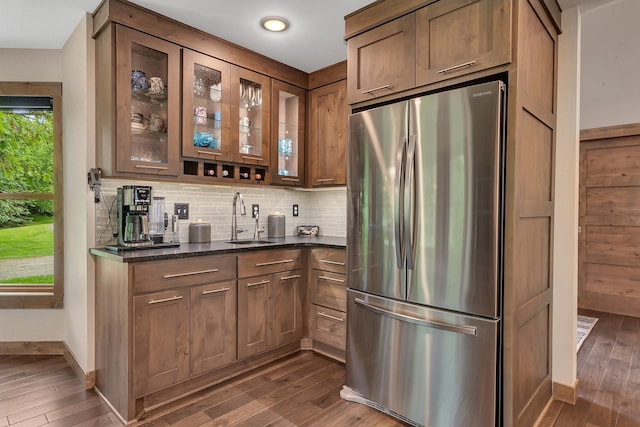27806 Sundance Ln, Cold Spring, MN 56320 - bar featuring freestanding refrigerator, dark wood finished floors, backsplash, and recessed lighting