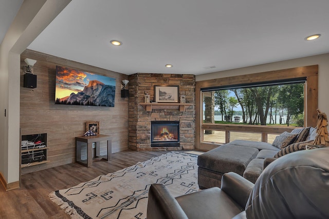 27806 Sundance Ln, Cold Spring, MN 56320 - living area featuring wooden walls, recessed lighting, wood finished floors, and a fireplace