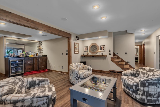 27806 Sundance Ln, Cold Spring, MN 56320 - living area with a bar, beverage cooler, dark wood-style flooring, stairway, and recessed lighting