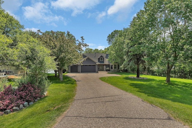 27806 Sundance Ln, Cold Spring, MN 56320 - view of front facade with an attached garage, driveway, and a front yard