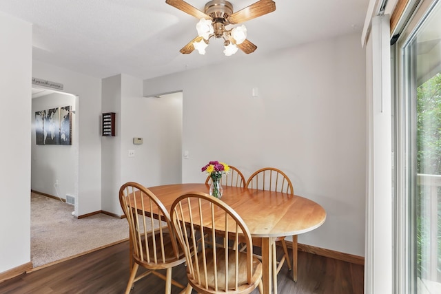 1202 Lyn Way, Hastings, MN 55033 - dining area featuring baseboards, wood finished floors, and a ceiling fan