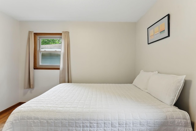 1202 Lyn Way, Hastings, MN 55033 - bedroom featuring wood finished floors and baseboards