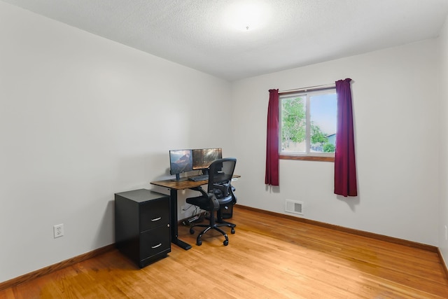 1202 Lyn Way, Hastings, MN 55033 - office area featuring light wood finished floors and baseboards