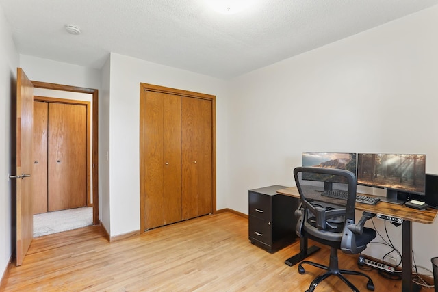 1202 Lyn Way, Hastings, MN 55033 - office featuring light wood-type flooring and baseboards