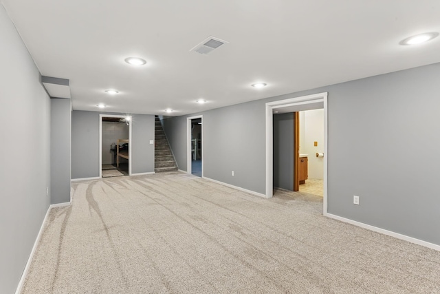1202 Lyn Way, Hastings, MN 55033 - finished basement with baseboards, stairway, carpet floors, and recessed lighting