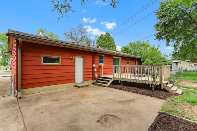 1202 Lyn Way, Hastings, MN 55033 - back of house featuring a patio area and a wooden deck