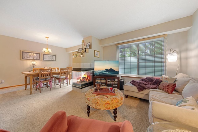 15610 24th Ave N Unit F, Plymouth, MN 55447 - carpeted living room featuring a chandelier and baseboards