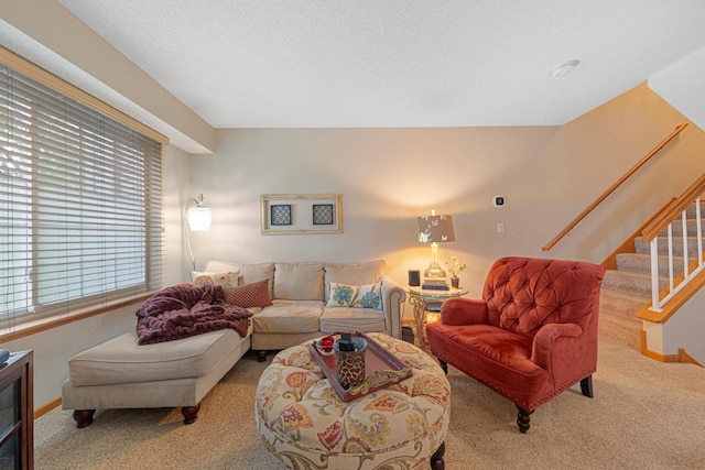 15610 24th Ave N Unit F, Plymouth, MN 55447 - carpeted living area featuring stairway and baseboards