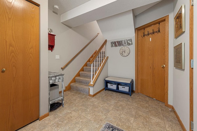 15610 24th Ave N Unit F, Plymouth, MN 55447 - foyer with baseboards and stairs