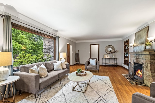 591 Wheelock Pkwy W, Saint Paul, MN 55117 - living area with a fireplace and wood finished floors