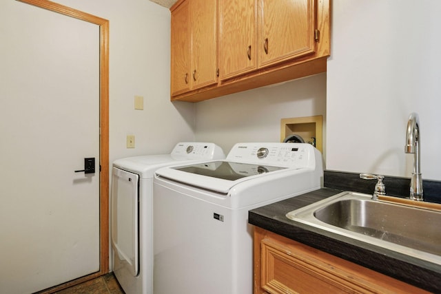 1502 Rocky Ln, Eagan, MN 55122 - laundry area featuring cabinet space and separate washer and dryer