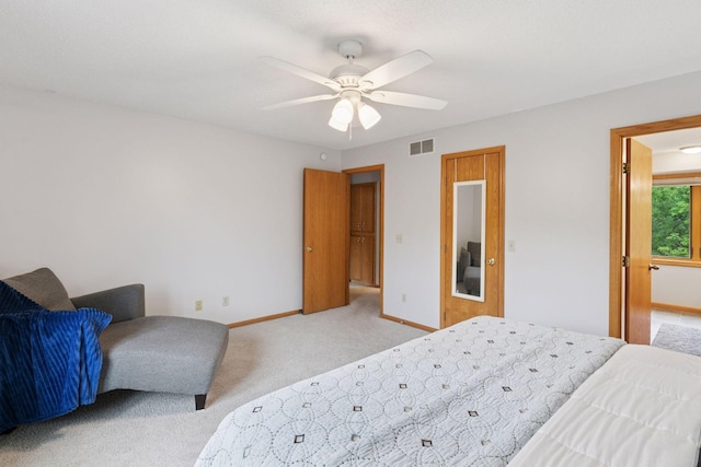 1502 Rocky Ln, Eagan, MN 55122 - bedroom with light colored carpet, baseboards, and a ceiling fan