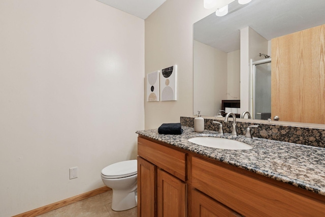 1502 Rocky Ln, Eagan, MN 55122 - full bath featuring vanity, a shower stall, toilet, tile patterned flooring, and baseboards