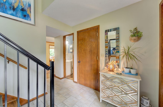 3021 Crescent Ln NW, Rochester, MN 55901 - foyer featuring stairs and baseboards