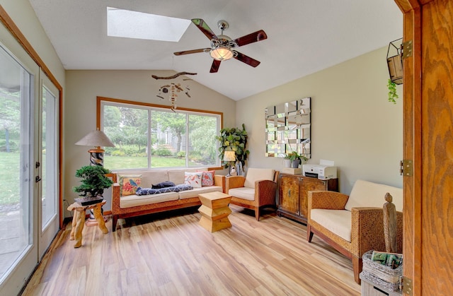 3021 Crescent Ln NW, Rochester, MN 55901 - sitting room with a skylight, lofted ceiling, a ceiling fan, and light wood finished floors