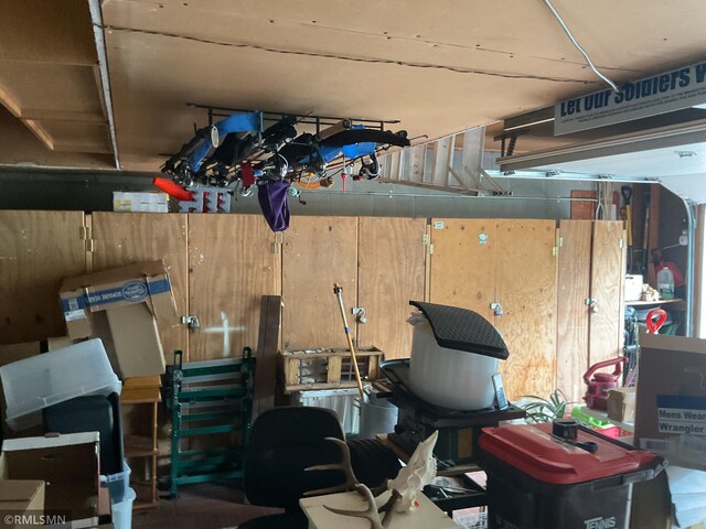 6800 Buckingham Ct, Woodbury, MN 55125 - storage area with a garage