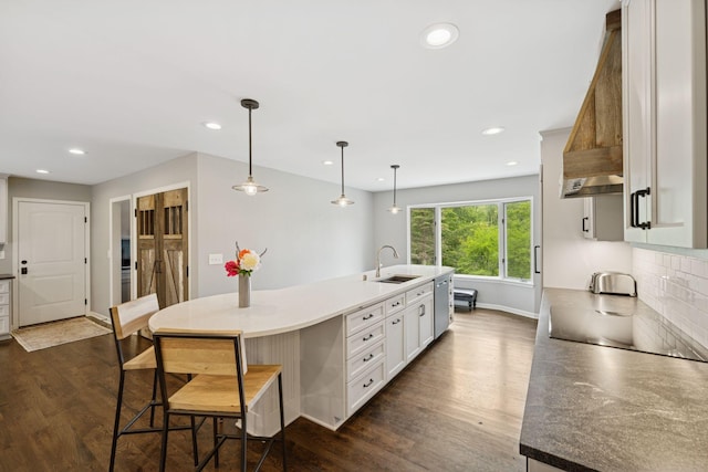200 Marie Ave W, West Saint Paul, MN 55118 - kitchen featuring black electric cooktop, dark wood finished floors, stainless steel dishwasher, white cabinetry, and recessed lighting
