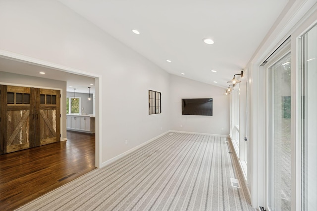 200 Marie Ave W, West Saint Paul, MN 55118 - carpeted spare room with vaulted ceiling and recessed lighting