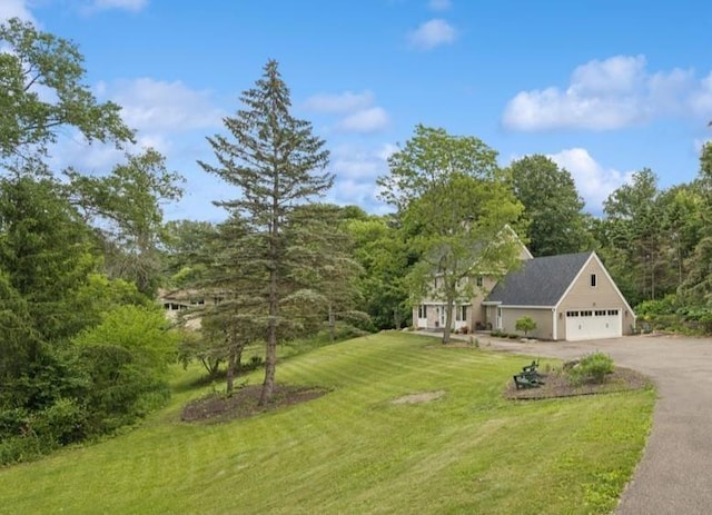 200 Marie Ave W, West Saint Paul, MN 55118 - view of front of house with asphalt driveway and a front lawn