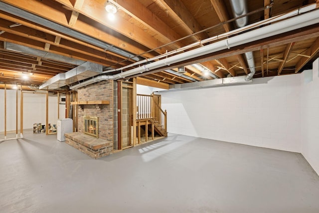 200 Marie Ave W, West Saint Paul, MN 55118 - unfinished below grade area featuring stairway and a brick fireplace
