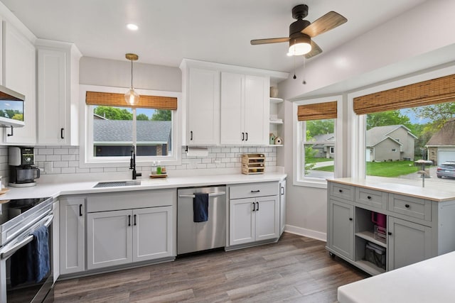 17698 Shore Ln W, Eden Prairie, MN 55346 - kitchen featuring appliances with stainless steel finishes, a sink, open shelves, backsplash, and a ceiling fan