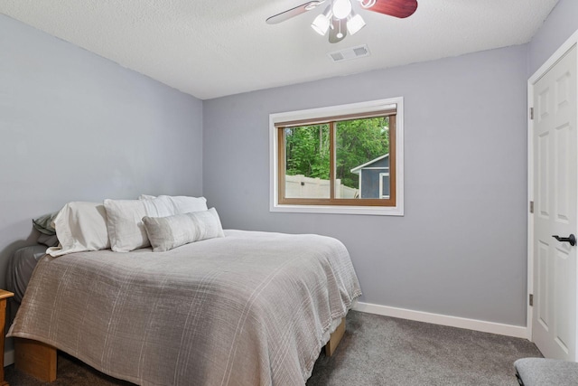 17698 Shore Ln W, Eden Prairie, MN 55346 - bedroom with carpet floors, baseboards, and a ceiling fan