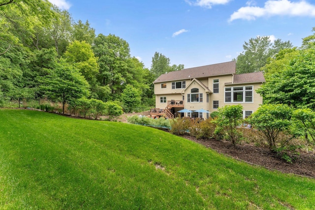 6539 Orchard Ridge Trl, Woodbury, MN 55129 - view of grassy yard with a wooden deck