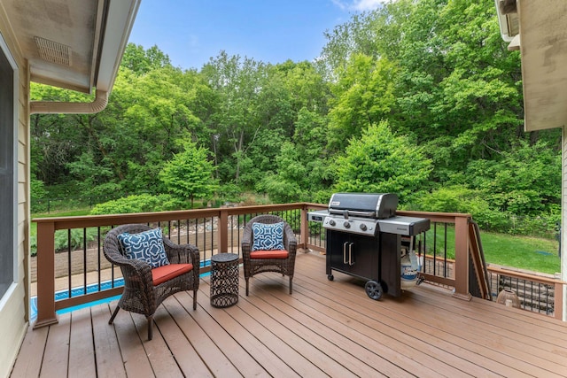 6539 Orchard Ridge Trl, Woodbury, MN 55129 - wooden deck with a view of trees and a grill