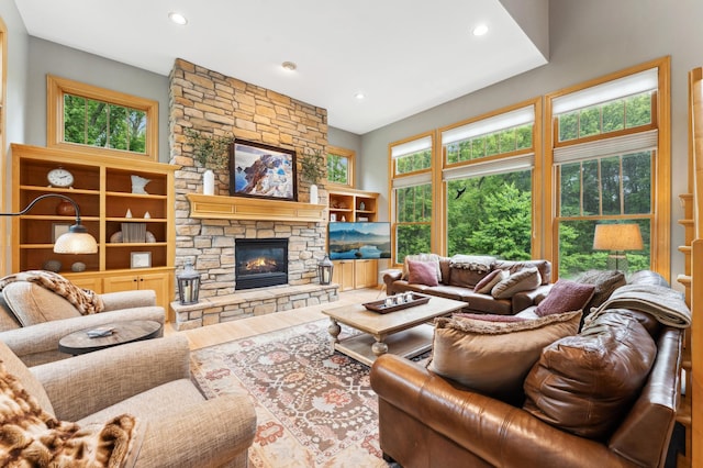 6539 Orchard Ridge Trl, Woodbury, MN 55129 - living room with plenty of natural light, a fireplace, recessed lighting, and wood finished floors