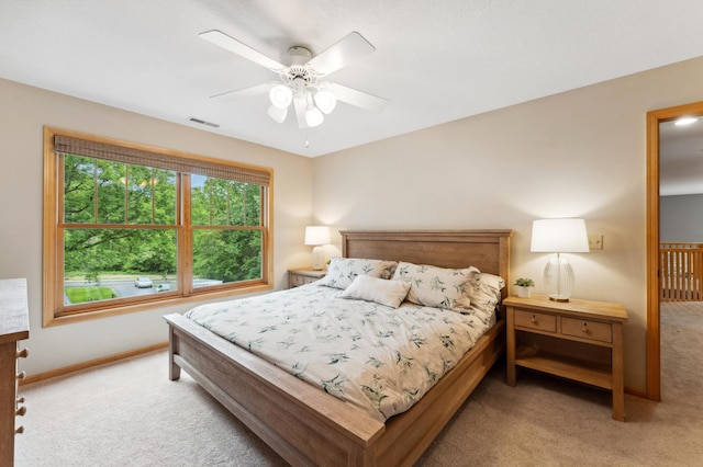 6539 Orchard Ridge Trl, Woodbury, MN 55129 - carpeted bedroom featuring baseboards and a ceiling fan