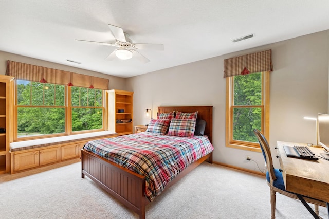 6539 Orchard Ridge Trl, Woodbury, MN 55129 - bedroom featuring light colored carpet, a ceiling fan, and baseboards