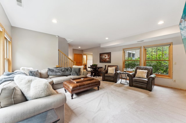 6539 Orchard Ridge Trl, Woodbury, MN 55129 - living room featuring stairway, recessed lighting, light carpet, and baseboards