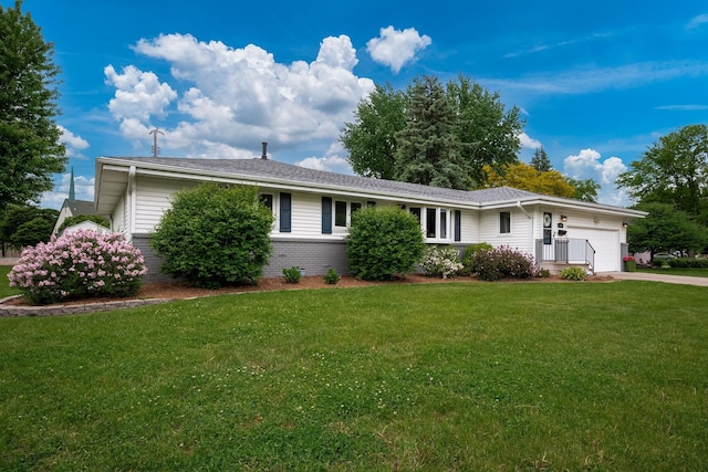 1305 Unity Ave N, Golden Valley, MN 55422 - ranch-style house with an attached garage, a front yard, concrete driveway, and brick siding