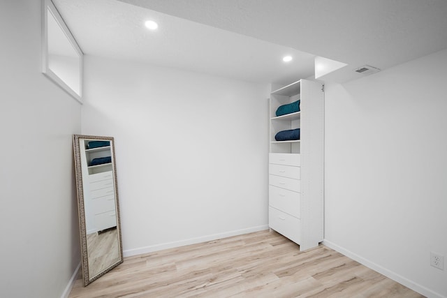 1305 Unity Ave N, Golden Valley, MN 55422 - unfurnished bedroom featuring light wood finished floors, recessed lighting, and baseboards