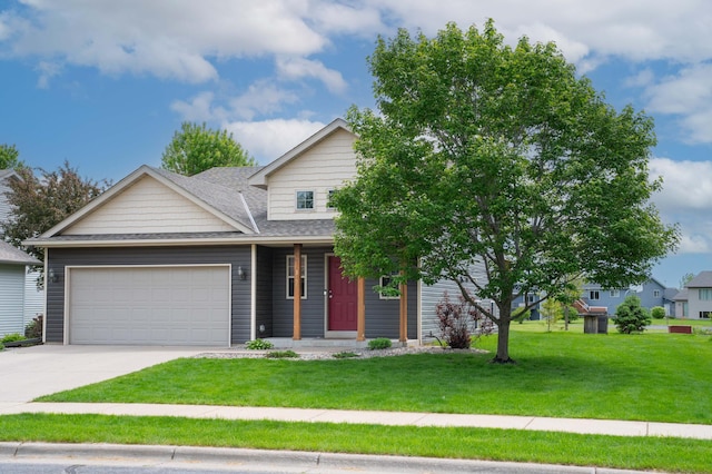 3138 Olympus Dr NE, Sauk Rapids, MN 56379 - view of front of property featuring a garage, a front yard, driveway, and a shingled roof