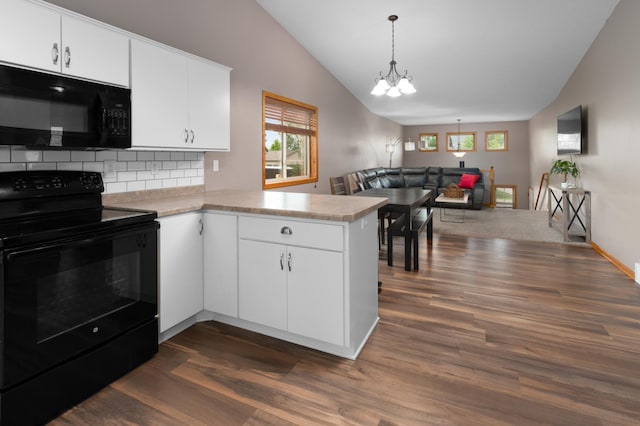 3138 Olympus Dr NE, Sauk Rapids, MN 56379 - kitchen featuring black appliances, lofted ceiling, dark wood finished floors, a peninsula, and healthy amount of natural light