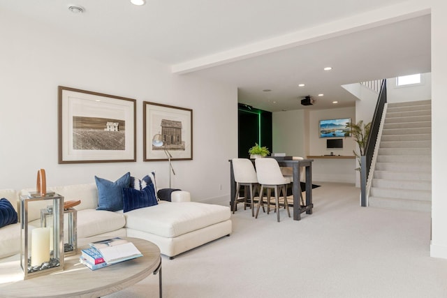 carpeted living area featuring stairway, recessed lighting, beamed ceiling, and baseboards