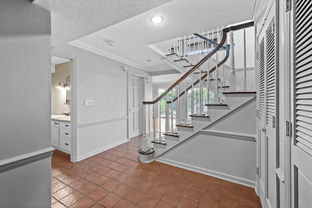 6331 Saint Croix Trl N, Stillwater, MN 55082 - stairs with tile patterned floors, crown molding, a textured ceiling, baseboards, and recessed lighting