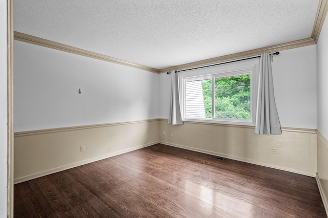 6331 Saint Croix Trl N, Stillwater, MN 55082 - spare room with a textured ceiling, ornamental molding, wood finished floors, and baseboards