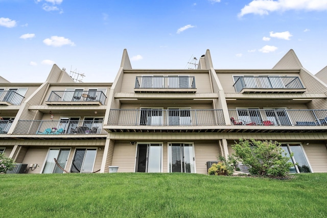 6331 Saint Croix Trl N, Stillwater, MN 55082 - back of house with a balcony and a yard